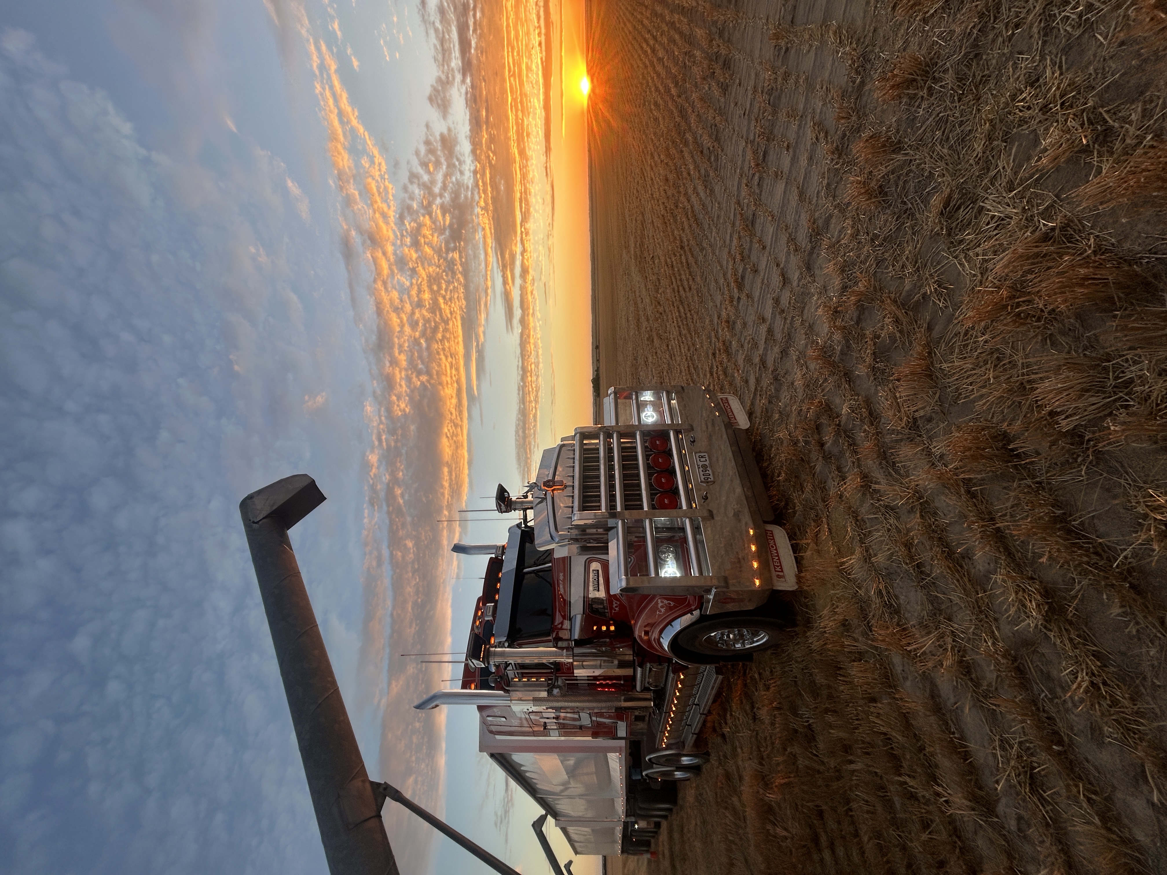 Kenworth road train at sunset